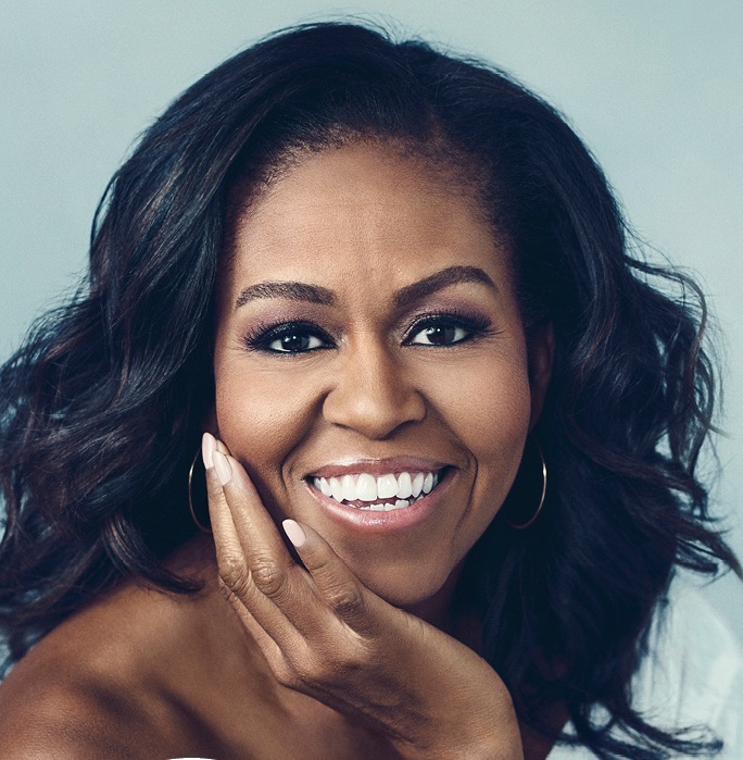 Michelle Obama smiles in the photo used for her book cover.